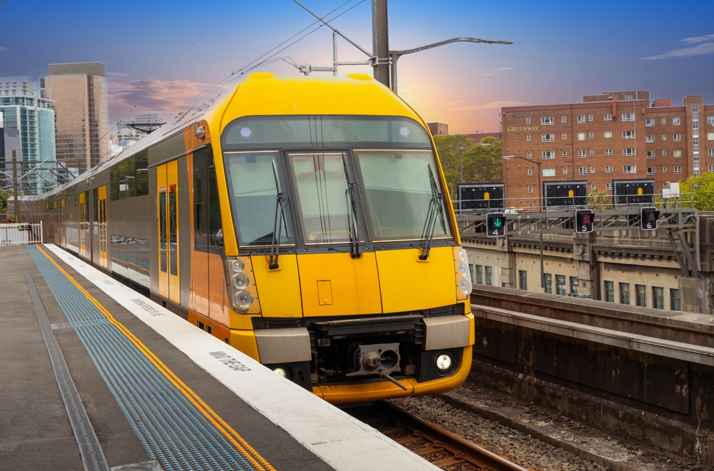 Commuter,Train,Fast,Moving,Through,A,Station,In,Sydney,Nsw